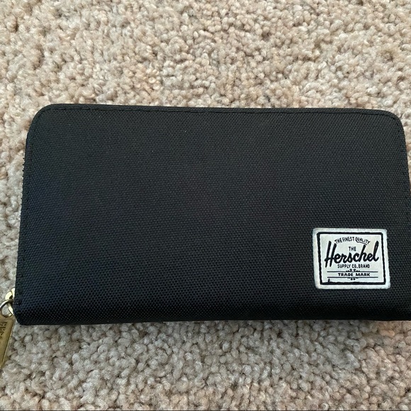Herschel Supply Company Handbags - Hershel Black Wallet - used - new condition. Zipper close / many inside pockets